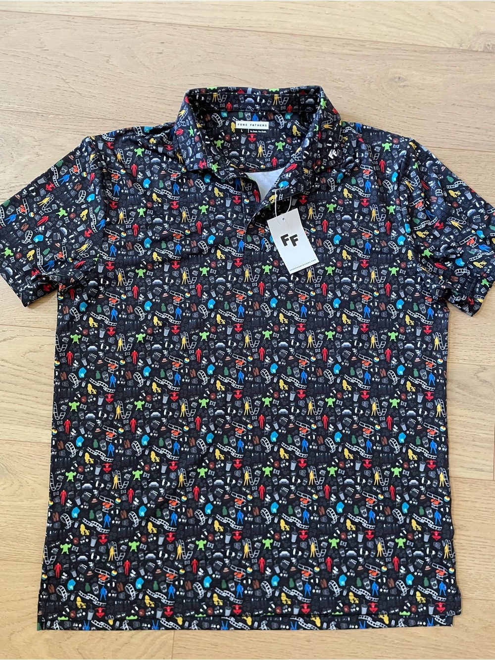 NWT Fore Fathers Move Character theme Black Short-Sleeve Printed Polo